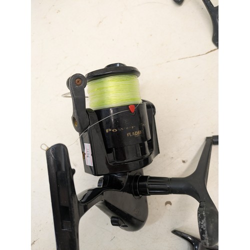 76 - A selection of 4 fishing reels