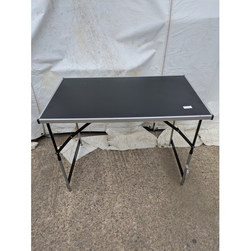 50 - A black collapsible table