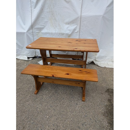 450 - A pine table with 2 bench seats