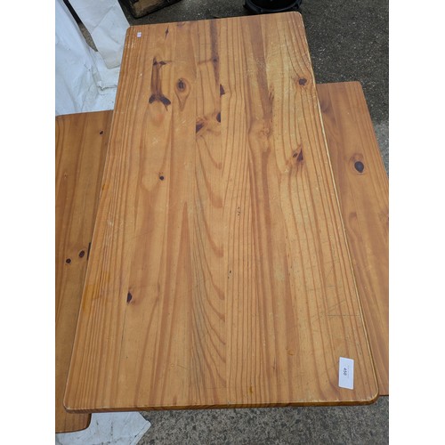 450 - A pine table with 2 bench seats