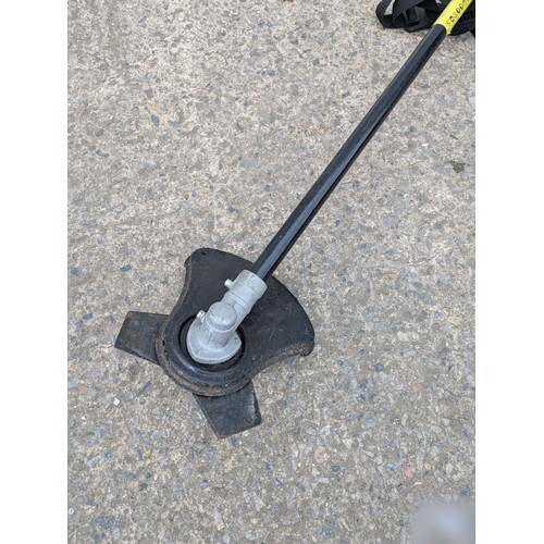 93 - A Ryobi Power Lte petrol strimmer brush cutter