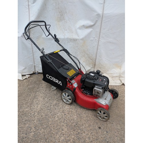 86 - A cobra petrol lawn mower with a Briggs and Stratton 450 e 125cc engine