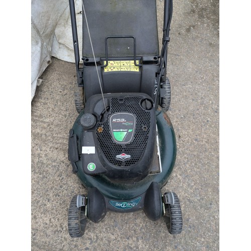 7 - A Rexling petrol lawn mower with a Briggs and Sttratton R53s engine