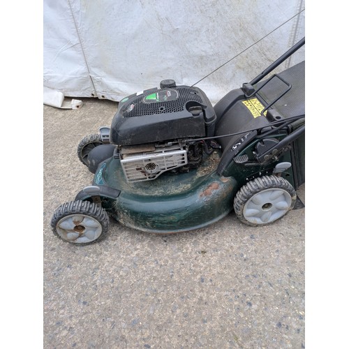 7 - A Rexling petrol lawn mower with a Briggs and Sttratton R53s engine