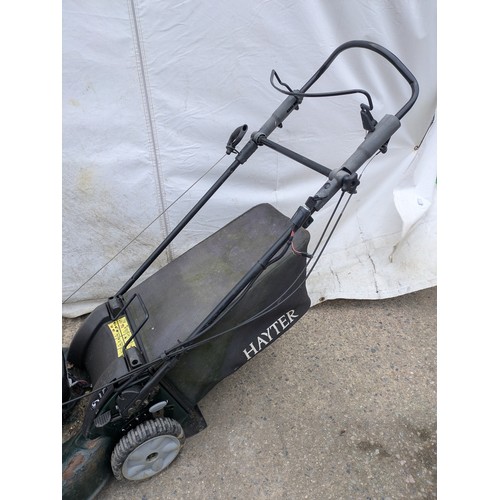 7 - A Rexling petrol lawn mower with a Briggs and Sttratton R53s engine