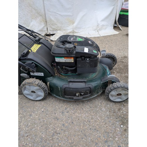 7 - A Rexling petrol lawn mower with a Briggs and Sttratton R53s engine