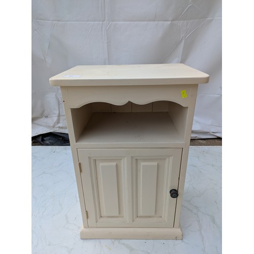 428 - A painted pine bedside table