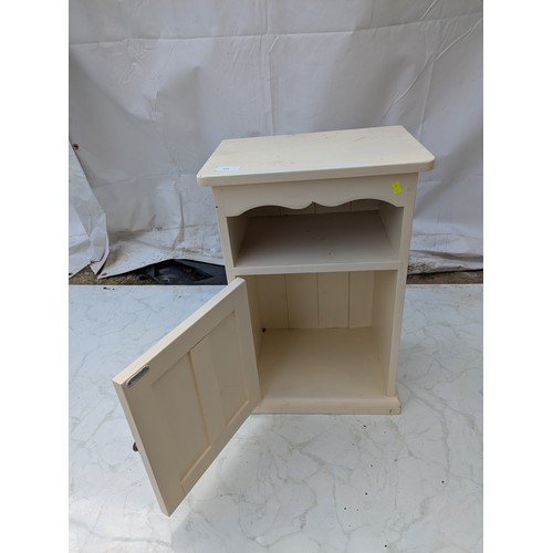 428 - A painted pine bedside table