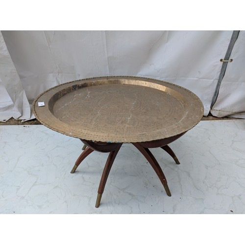 454 - An oriental brass tray table with stand