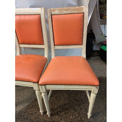 415 - A set of 6 painted pine dining chairs with red faux leather upholstery