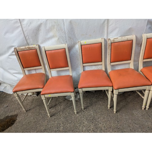 415 - A set of 6 painted pine dining chairs with red faux leather upholstery