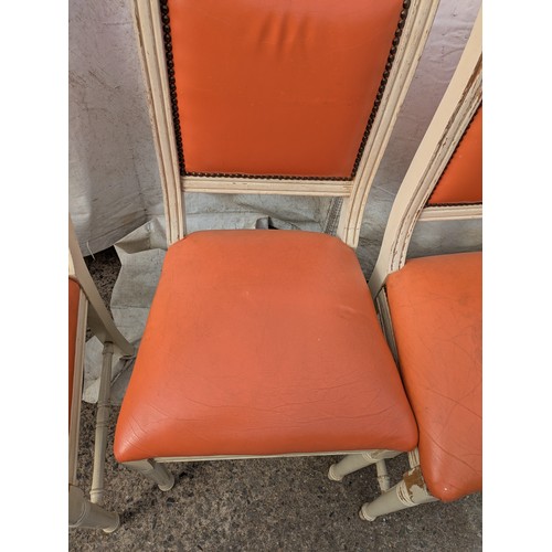 415 - A set of 6 painted pine dining chairs with red faux leather upholstery