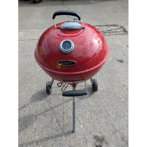 125 - A red outback barbecue smoker