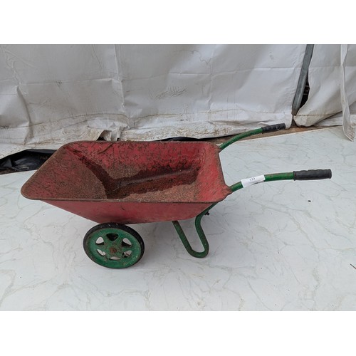 133 - A vintage metal children's wheelbarrow