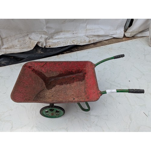 133 - A vintage metal children's wheelbarrow