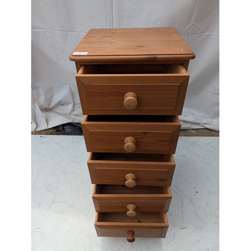 402 - A pine 5 drawer chest of drawers