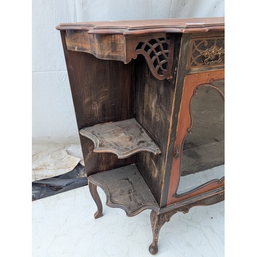 460 - A stylish Victorian mahogany display unit with glass Fronted shelving area and exterior Bevelled she... 