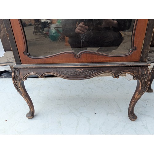 460 - A stylish Victorian mahogany display unit with glass Fronted shelving area and exterior Bevelled she... 