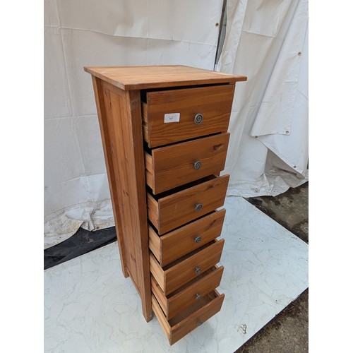 427 - A pine 7 drawer storage unit