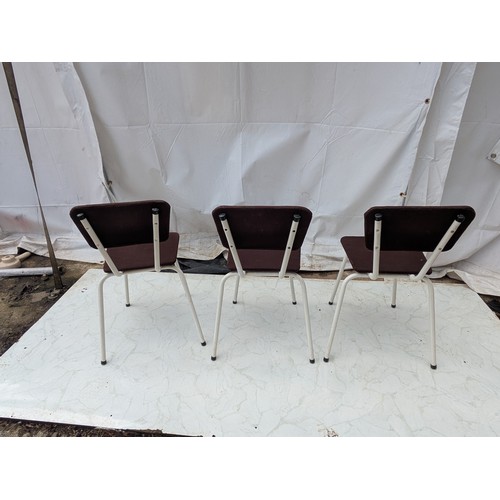 425 - A selection of retro metal framed chairs