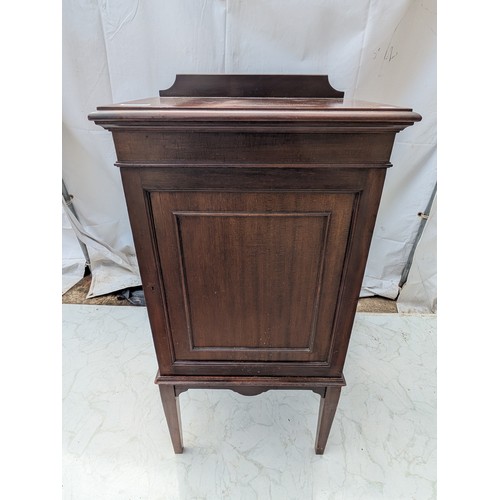 422 - An early 20th century mahogany storage cabinet with interior drawers