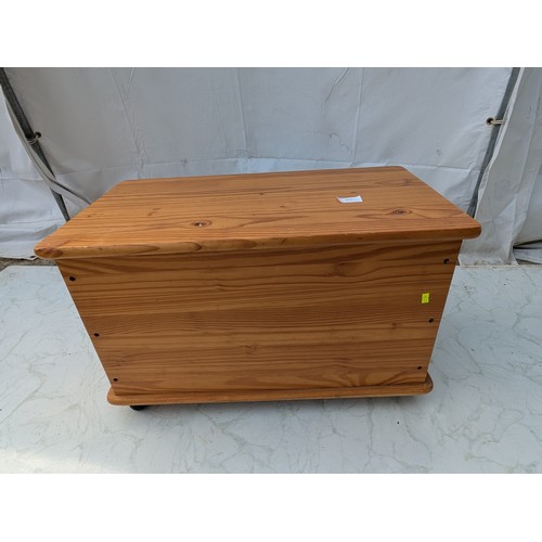 418 - A small pine storage trunk