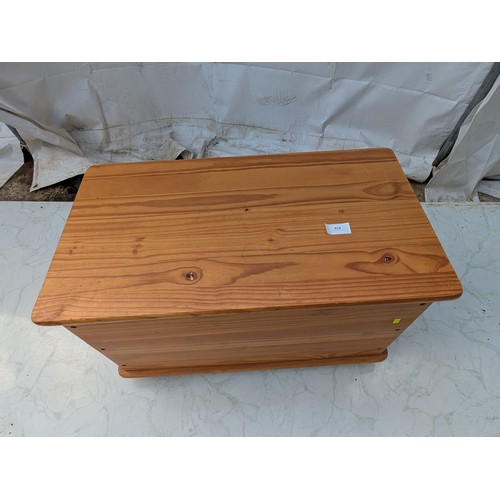 418 - A small pine storage trunk