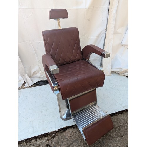 405 - A retro red faux leather and chrome barber's chair - fully adjustable with head rest