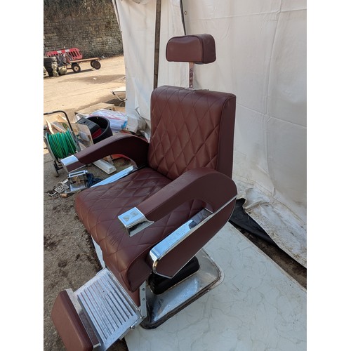 405 - A retro red faux leather and chrome barber's chair - fully adjustable with head rest