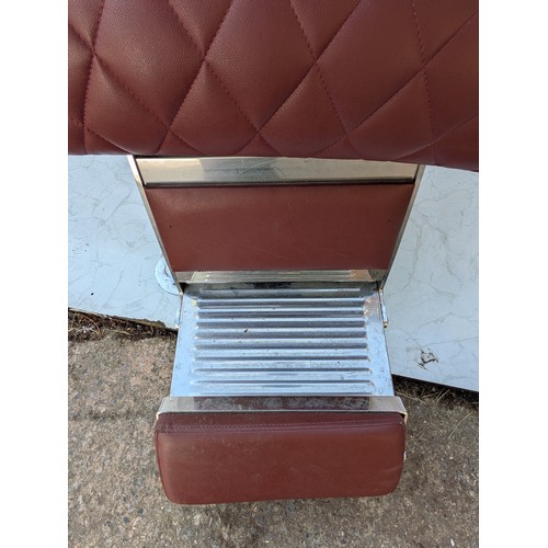 405 - A retro red faux leather and chrome barber's chair - fully adjustable with head rest