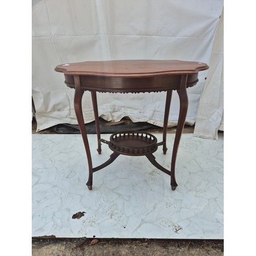 458 - An antique mahogany occasional table with underlying shelf - needs light tlc