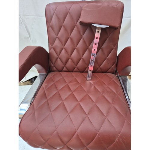 407 - A retro red faux leather and chrome barber's chair - fully adjustable with head rest