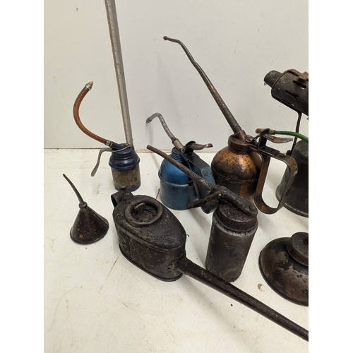 800 - A selection of various oil cans including Wesco, and one gas torch