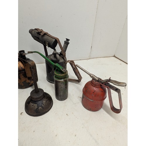 800 - A selection of various oil cans including Wesco, and one gas torch