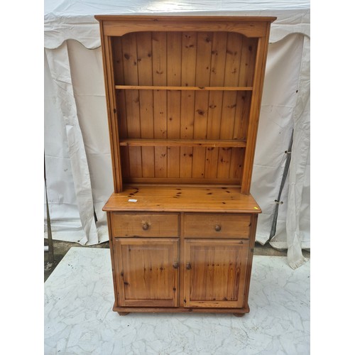 414 - A pine dresser by Yorkshire Pine - 2 drawers and storage space