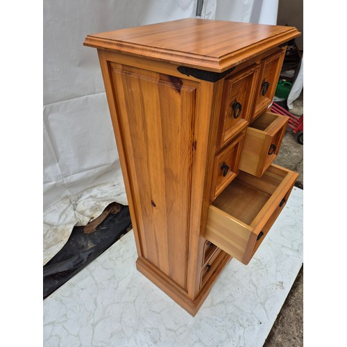 434 - A tall 7 drawer mexicn style pine storage unit