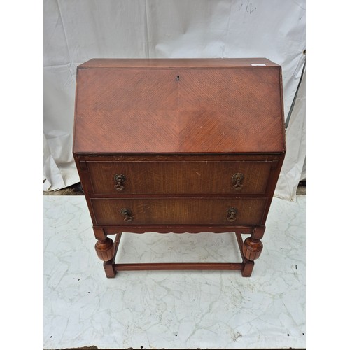 412 - A vintage Oak vernier bureau with 2 underlying drawers