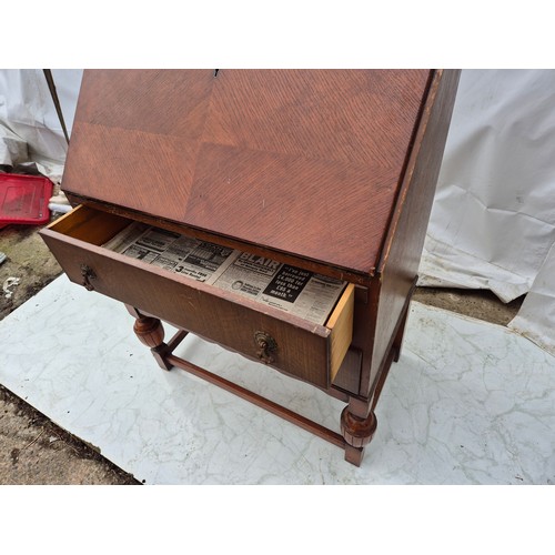 412 - A vintage Oak vernier bureau with 2 underlying drawers