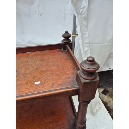 435 - A charming victorian mahogany wheeled service trolley