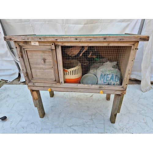 123 - An outdoor rabbit hutch with a selection of accessories