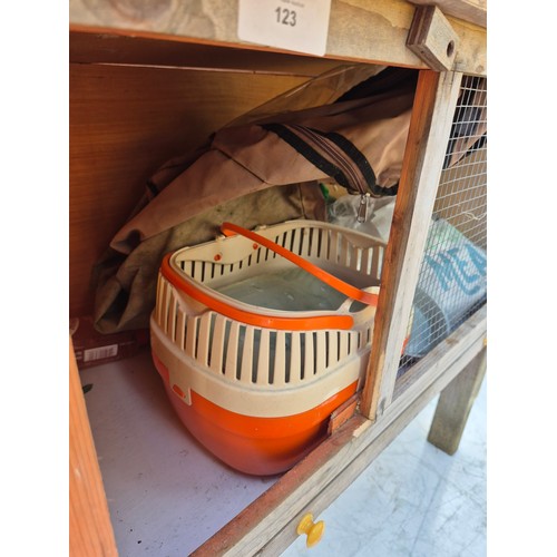 123 - An outdoor rabbit hutch with a selection of accessories