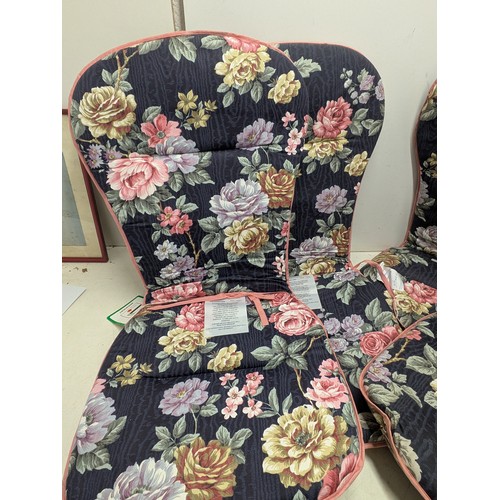 138 - A selection of floral outdoor seat cushions