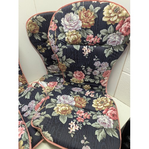 138 - A selection of floral outdoor seat cushions