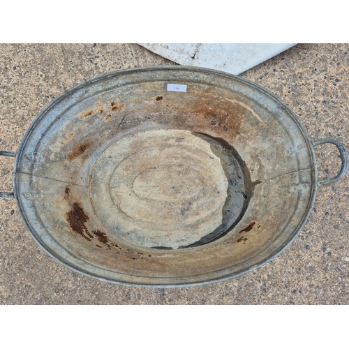 115 - A large vintage galvanized bucket