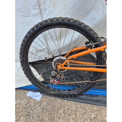 13 - A full suspension mountain bike with dual crown front forks