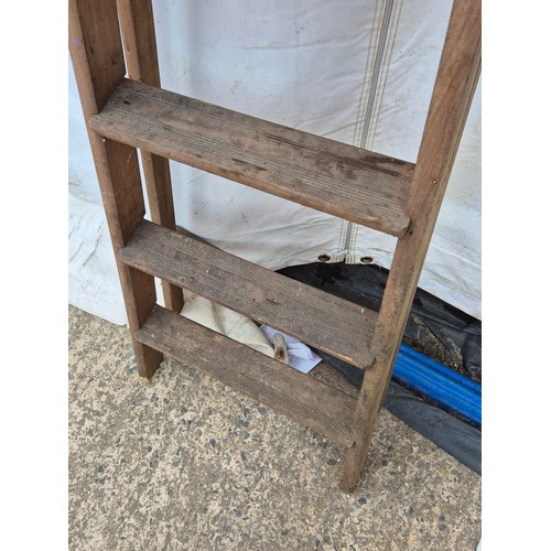 132 - A vintage wooden folding ladder