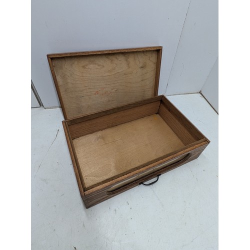 429 - A pine box with a glass viewing window and brass handle