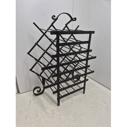 608 - A wrought iron, 21 bottle wine rack