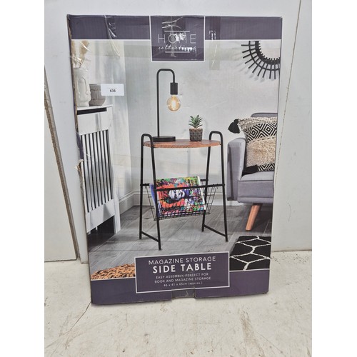 635 - A magazine side table with metal frame in box