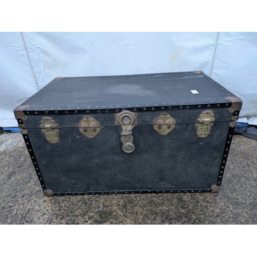 279 - A large canvas storage trunk